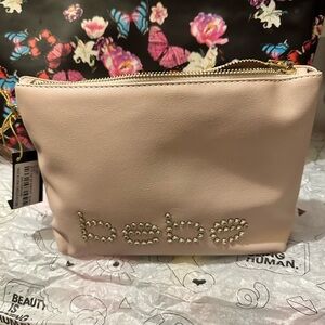 BEBE ZIP WRISTLET BLUSH